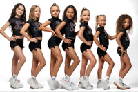 Black Scrunch Side - Short stylishly modeled by young girls, showcasing scrunch sides and cute bow ties.