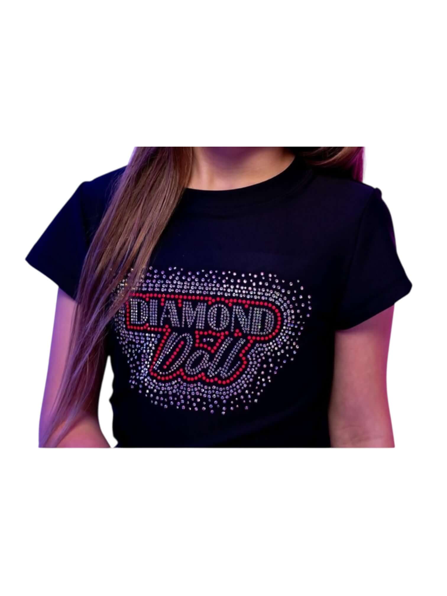 Image of a girl wearing a Diamond Doll Baby Tee, featuring a rhinestone design on a black t-shirt.