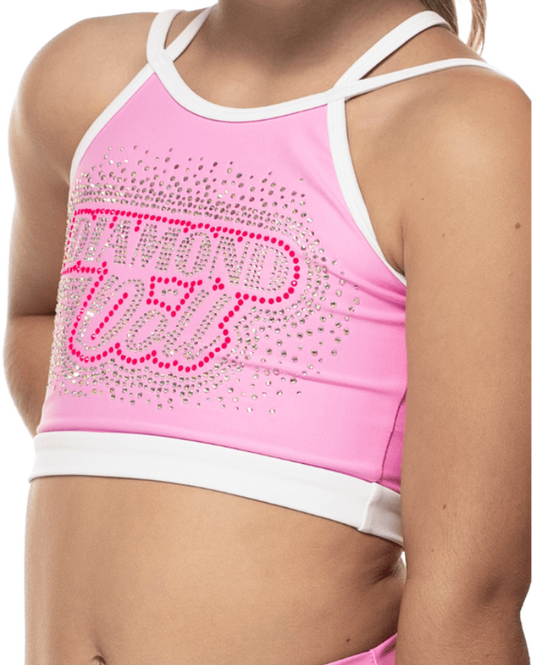 Young girl wearing a pink sports outfit with 'Fuz' branding on a white background