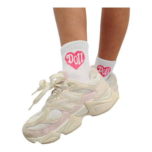 Doll Socks featuring pink love heart design, worn with trendy athletic shoes, perfect for stylish outfits.