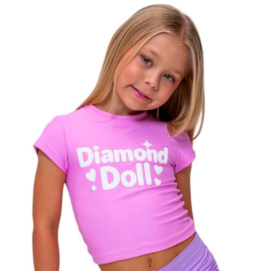 Puff Print Baby Tee in Bubblegum worn by a child, featuring a bold 'Diamond Doll' logo and playful fit.