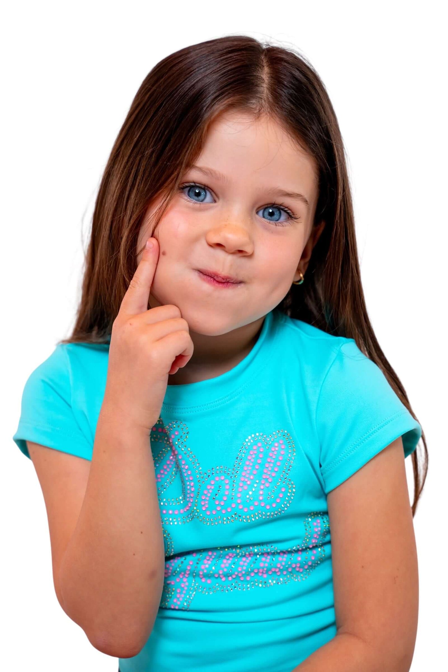 Cute girl wearing Doll Squad Baby Tee in turquoise, demonstrating playful expression and style.