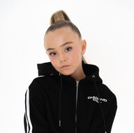 Person wearing a black hoodie with white stripes on a white background