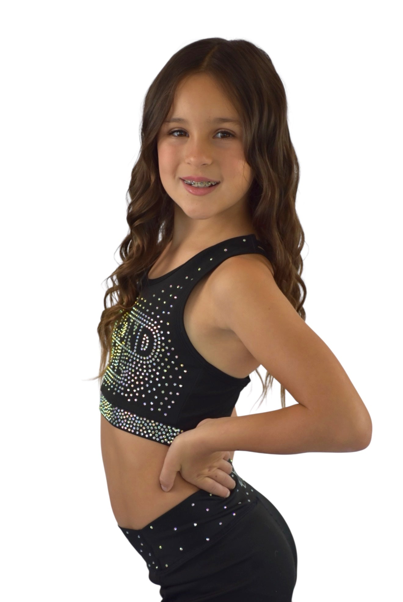 Girl wearing Diamond Doll Rhinestone - Crop top showcasing rhinestones and a strappy back, radiating sparkle and style.