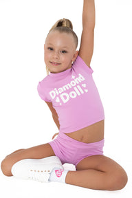 Puff Print Active Tee worn by girl in bubblegum pink, featuring a bold 'Diamond Doll' logo.